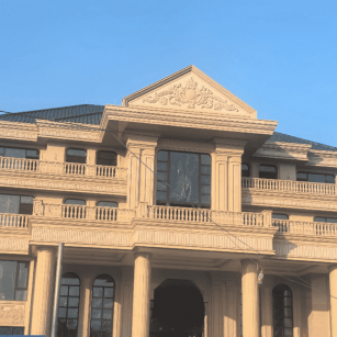 亳州黄金麻别墅外墙干挂石材效果示例